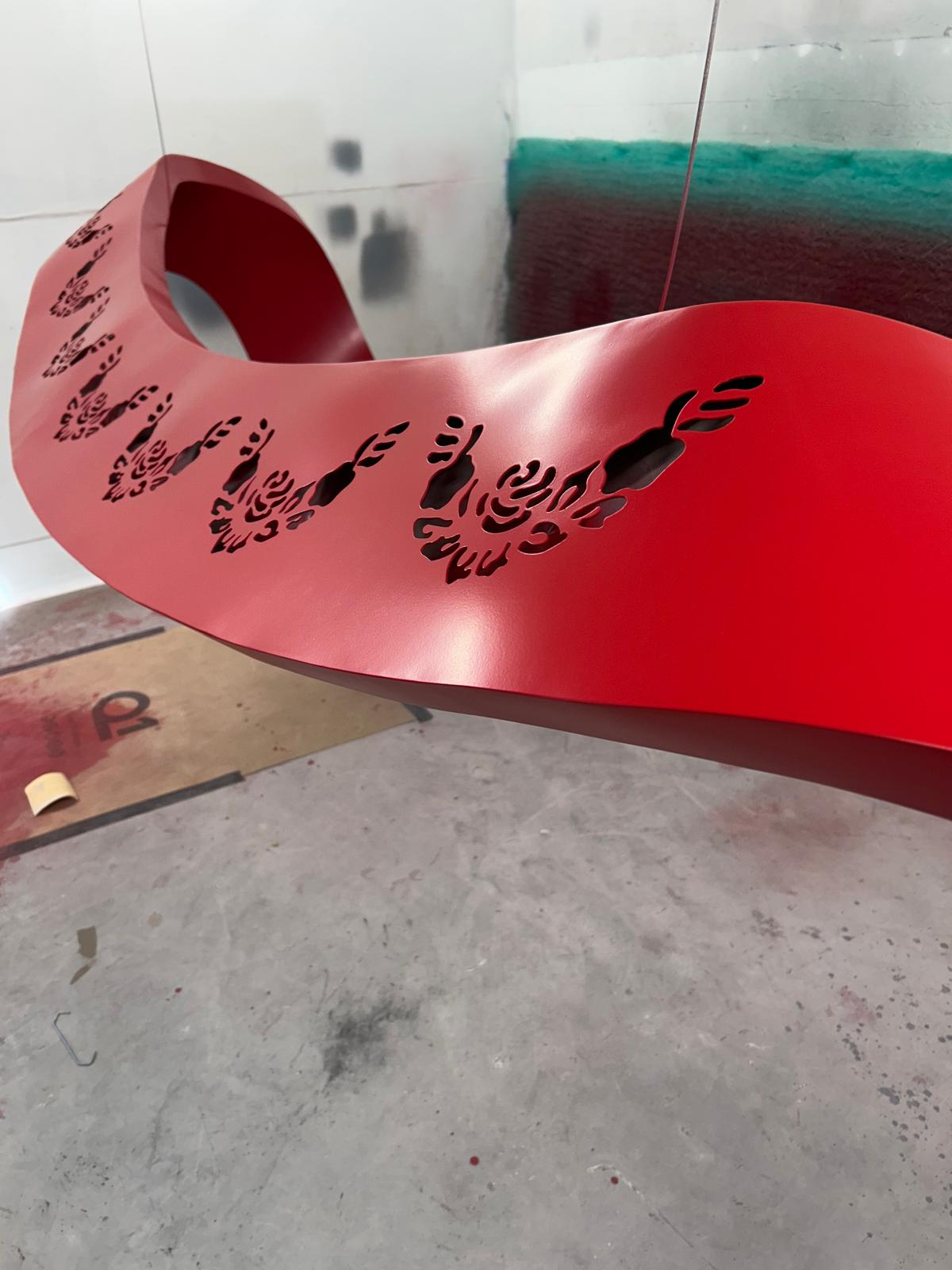 Bespoke red sprayed metal sculpture