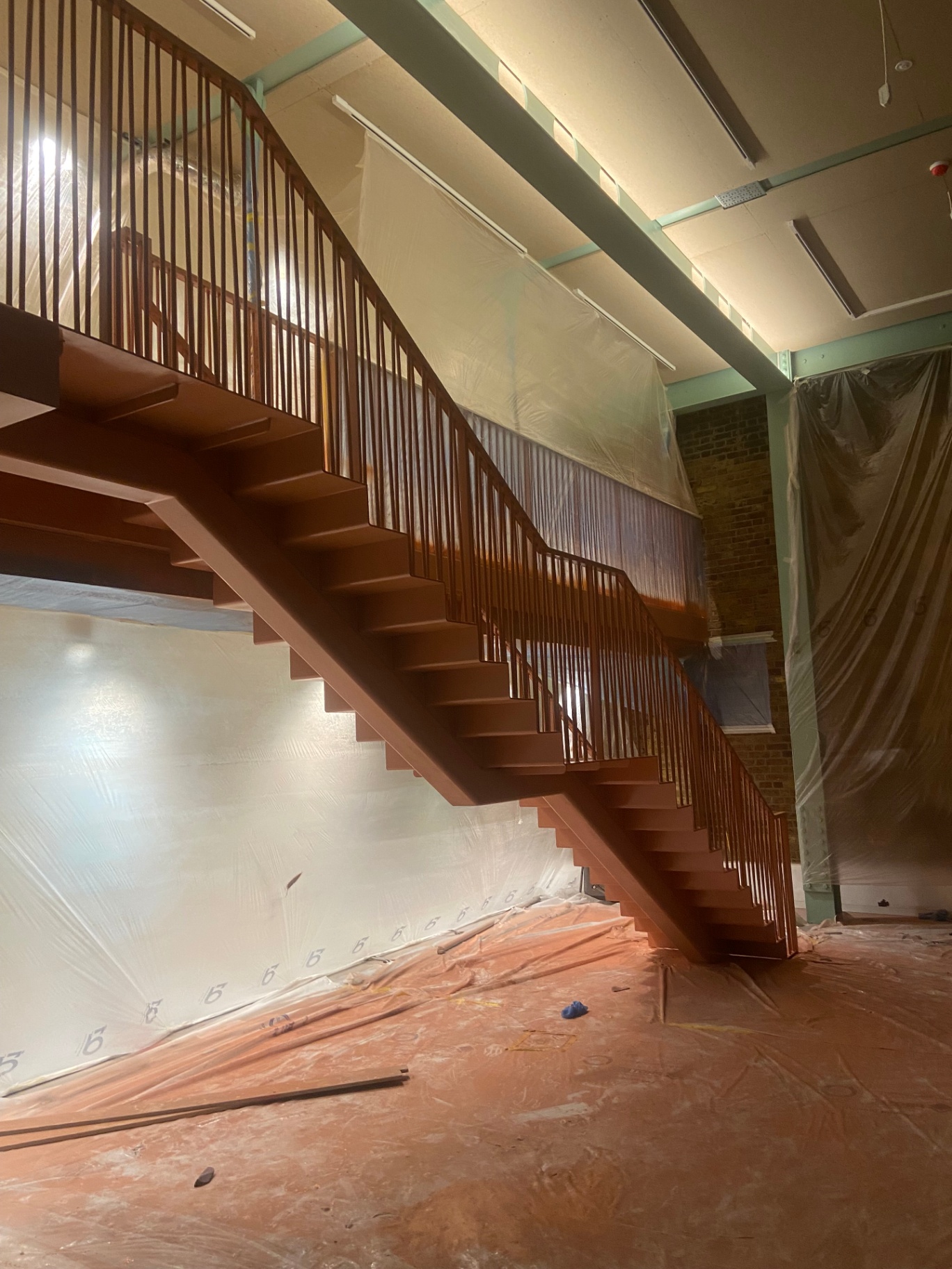 Professional feature staircase spraying by Shaw Spray Ltd in West Sussex