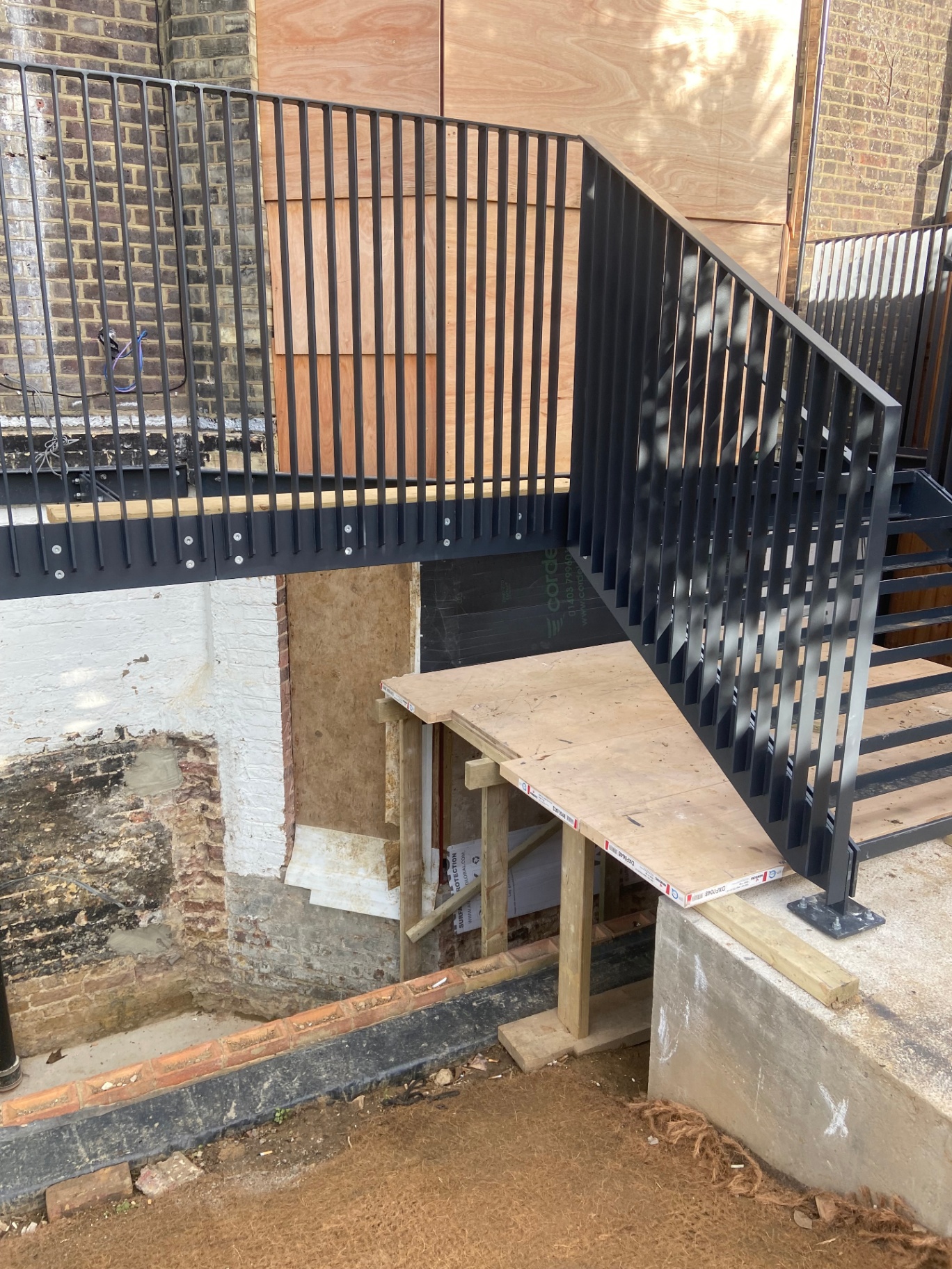 Professional feature staircase spraying by Shaw Spray Ltd in West Sussex