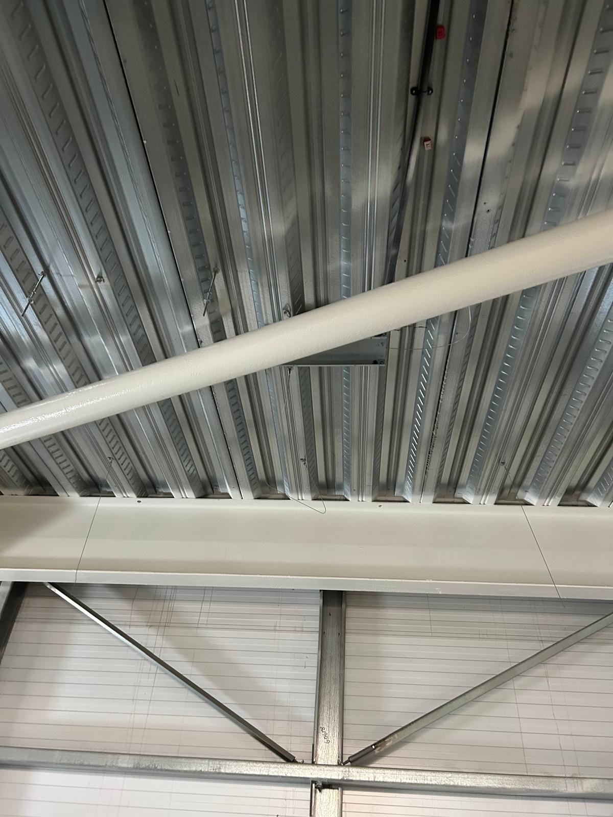 On-site sprayed structural steel framework