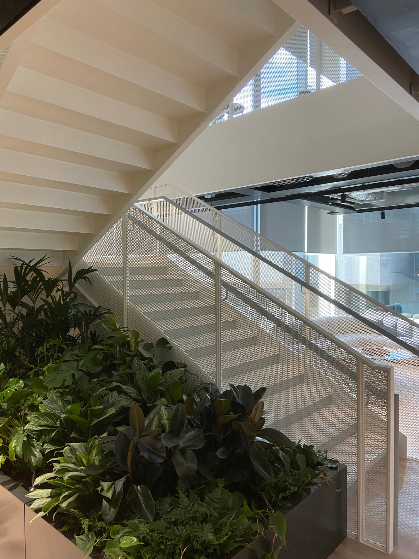 Professional feature staircase spraying by Shaw Spray Ltd in West Sussex