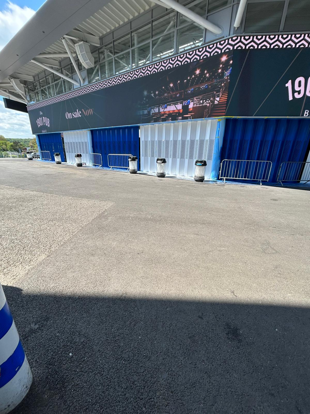 Sprayed stadium facade panels