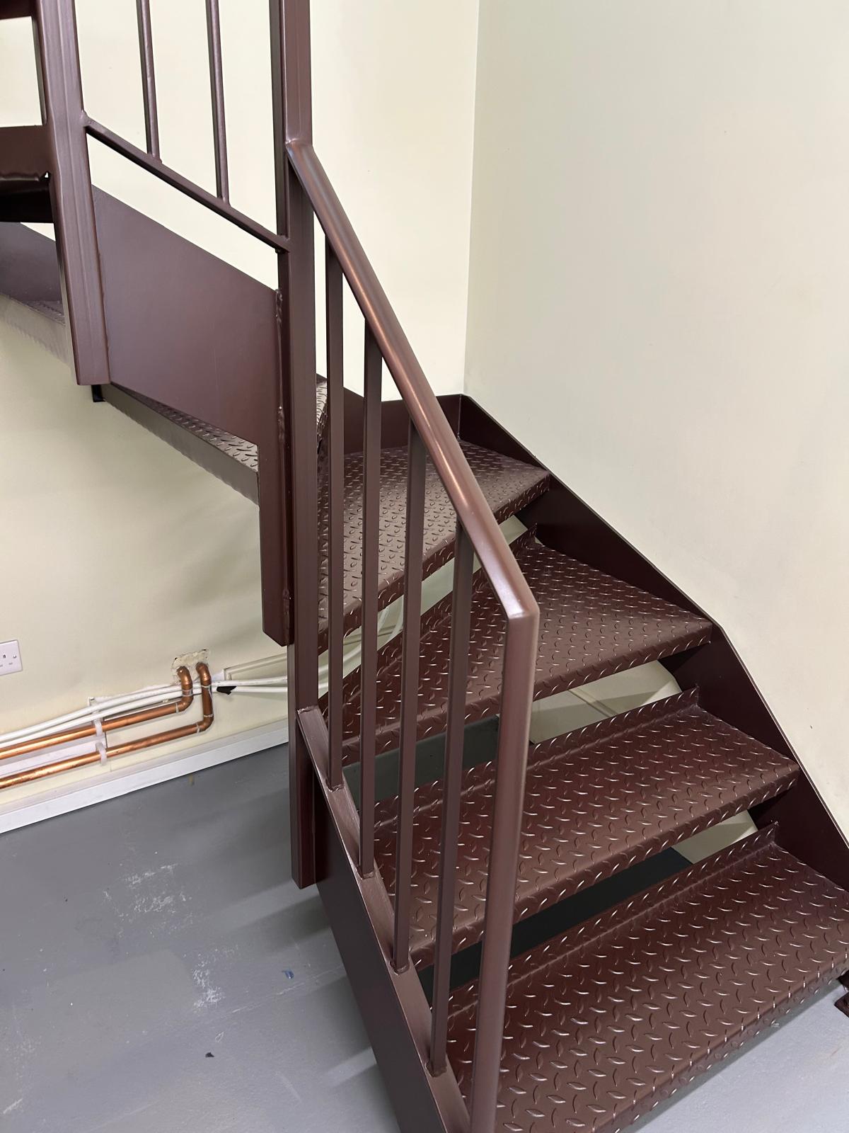 Professional feature staircase spraying by Shaw Spray Ltd in West Sussex