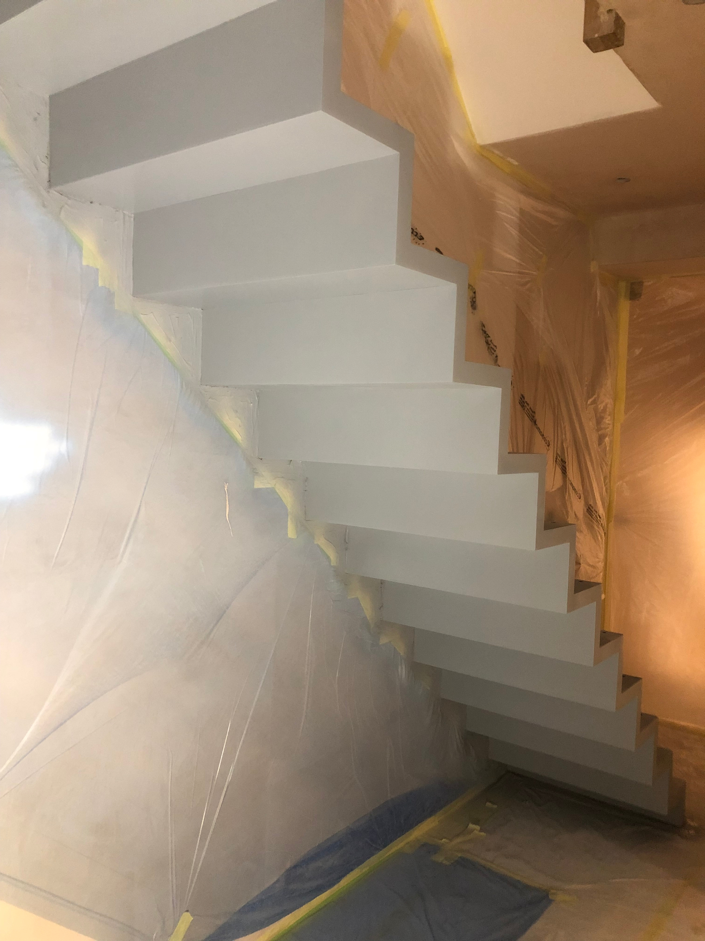 Professional feature staircase spraying by Shaw Spray Ltd in West Sussex